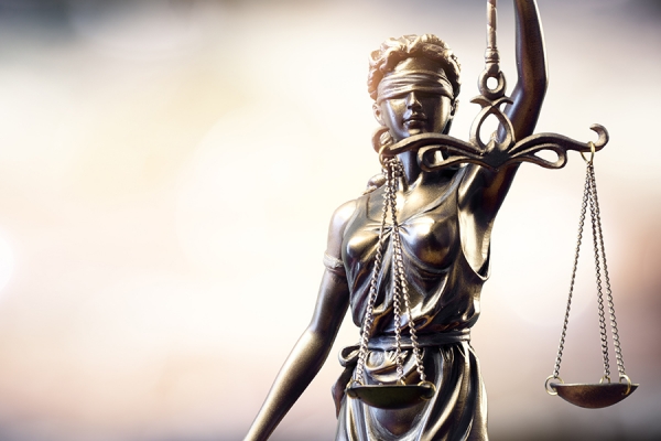 statue of justice holding scales