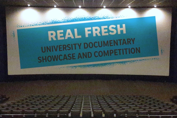 Movie screen displaying &quot;Real Fresh&quot; student film showcase