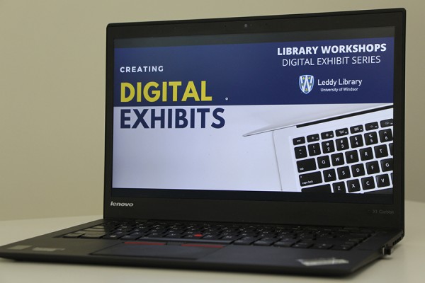 Laptop computer displaying Creating Digital Exhibits.