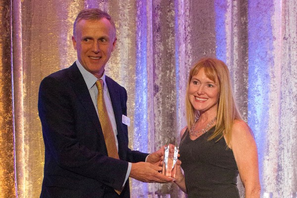 UWindsor associate professor Lisa Porter receives the 2018 David Kelly Award for Community Service from Chris Sullivan, chair of the board of directors of the Brain Tumour Foundation of Canada.