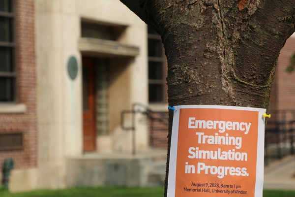 sign reading &quot;Emergency Simulation Training in progress&quot; outside Memorial Hall