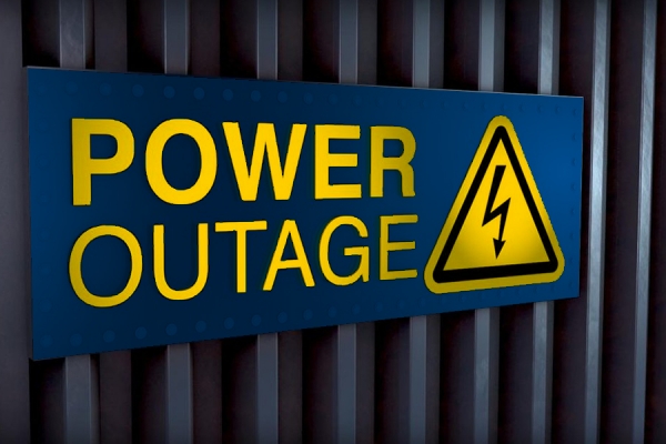 sign reading &quot;Power outage&quot;