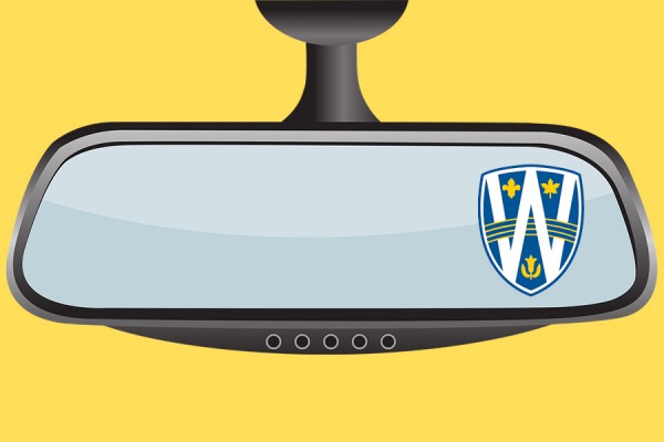 rear-view mirror with UWindsor shield logo