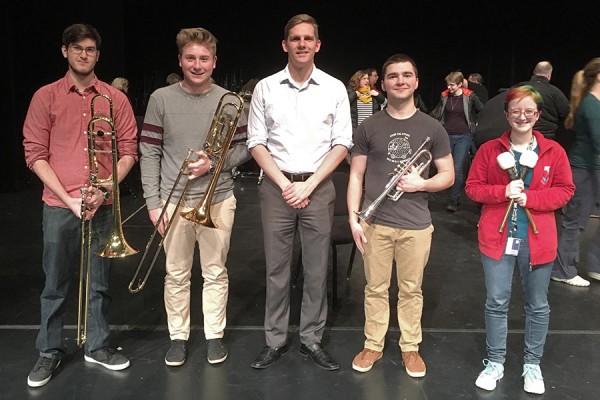 Trombonist Carter Gaus, trombonist Mackenzie Walsh, conductor Daniel Wiley, trumpeter Matthew Lepain, percussionist Sydney Brouillart-Coyle.