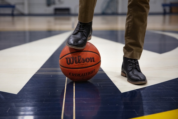 feet standing in basketball court