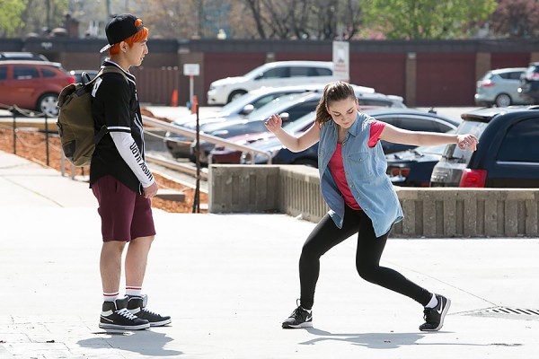 Actors Daegun Daniel Lee and Jessie Cox in a scene from “Stand Up Man” filmed on the UWindsor campus.