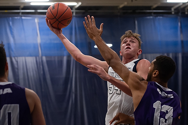 Thomas Kennedy makes a play over a defender