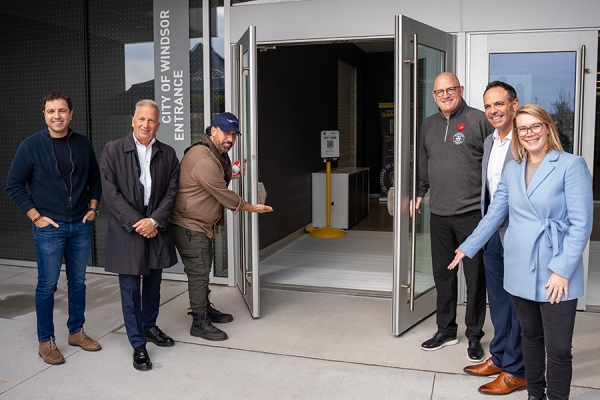 university and civic officials gathered at Lancer Centre entrance