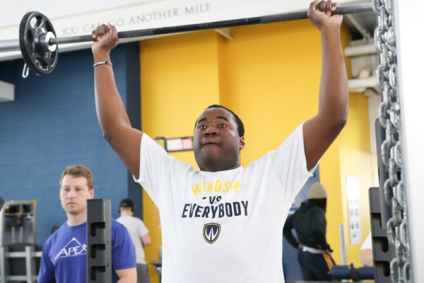 Josh Palmer, participant in Fit Together, performs a barbell push press at the Forge on Wednesday, Dec. 5, 2017. Fit Together is an exercise program for adults with autism spectrum disorder and an intellectual disability operated by UWindsor&#039;s Adapted Phy