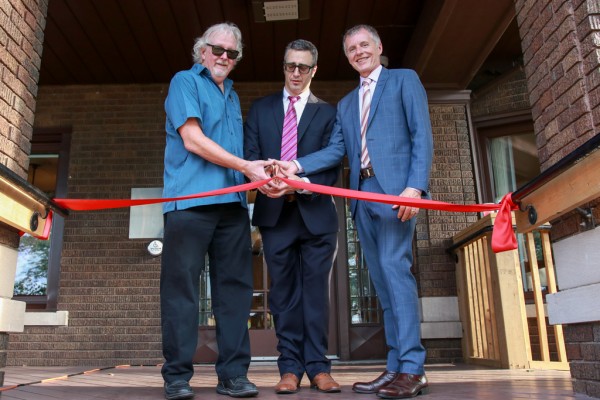 UWindsor Psychology Department Head Dennis Jackson, PSRC Director Antonio Pascual-Leone and University President Alan Wildeman cut the ribbon at the grand opening of the Psychological Services and Research Centre on Sept. 21, 2017.