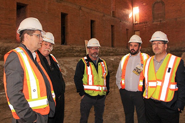 officials on tour in Armouries