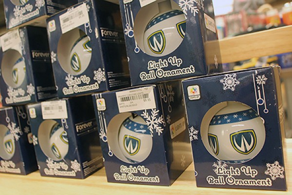 The Campus Bookstore is selling light-up Christmas ornaments printed with the Lancer shield for $9.95.