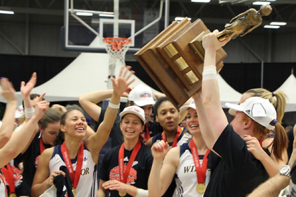 Lancers hold aloft the Bronze Baby trophy