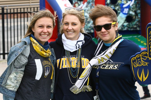 students pose in Lancer gear