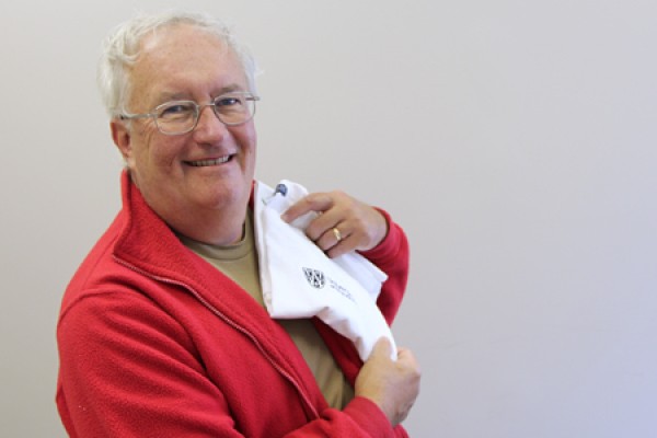 UWindsor alumnus Malcolm Campbell shows off his prize T-shirt.