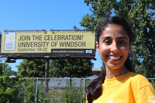 Giant billboard behind student