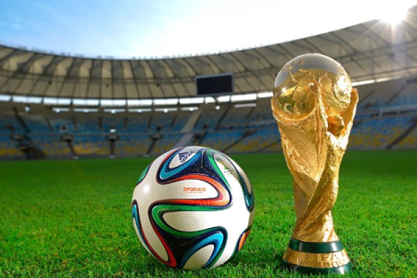 World Cup, soccer ball in stadium.
