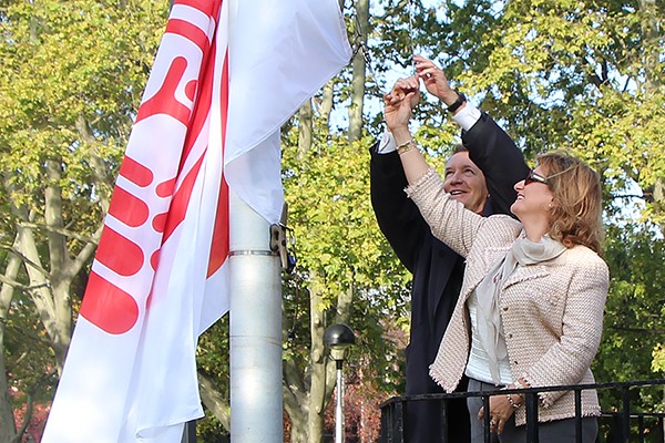Douglas Kneale and Rita LaCivita team up to raise the United Way flag