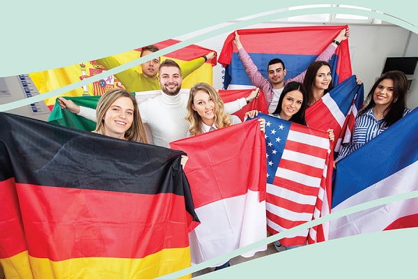 students holding flags of many countries