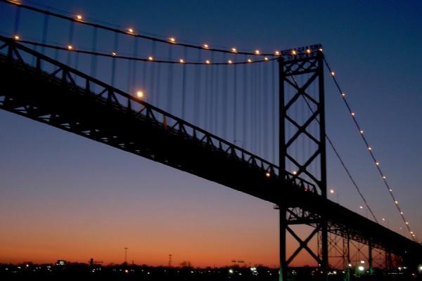 The Ambassador Bridge is pictured from Windsor at sunset.
