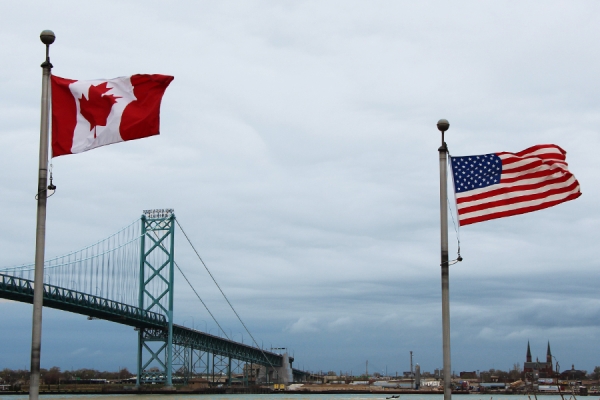 Ambassador Bridge with Canadian and U.S. flags
