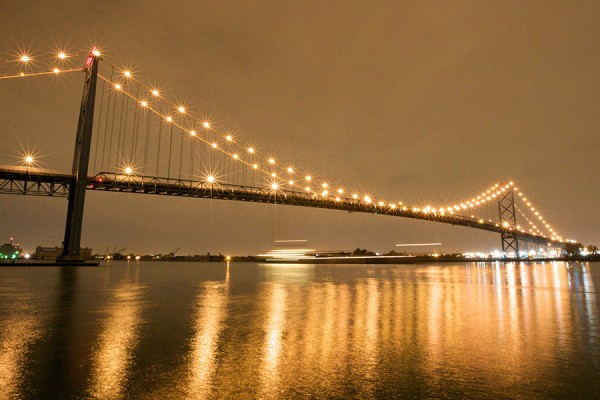 Ambassador Bridge lit up under night sky