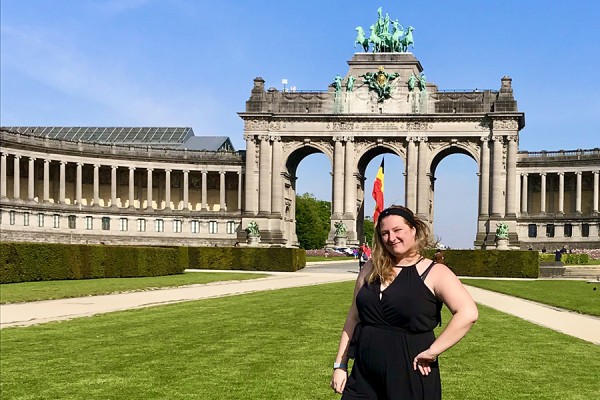 Caley Hewitt in front of triumphal arch