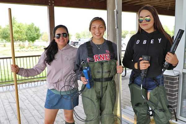 Catherine Febria trains Bkejwanong youth Kaitlyn Issac and Taylor Myers