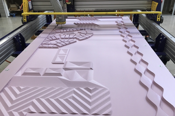 panels running through CNC machine