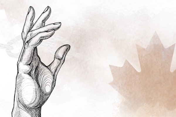 hand with maple leaf