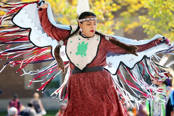 Student performing Indigenous dance