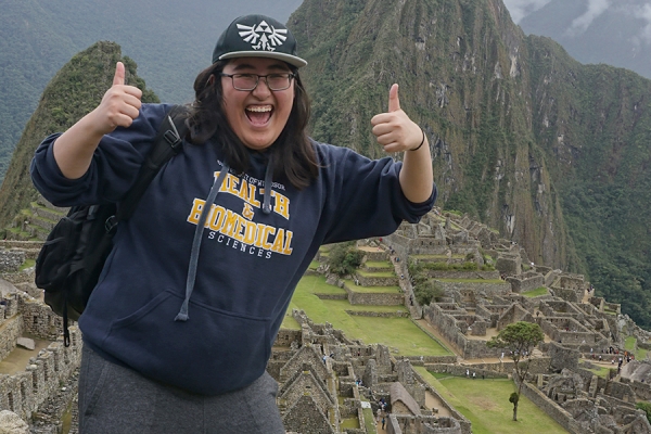Kim Nguyen celebrates her climb to Machu Picchu