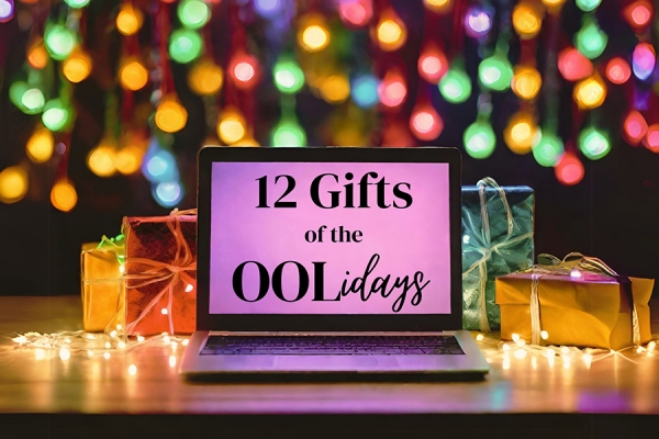 A laptop reading 12 Gifts of the OOLidays surrounded by colourful lights and small gift boxes