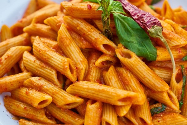 plate of penne with tomato sauce
