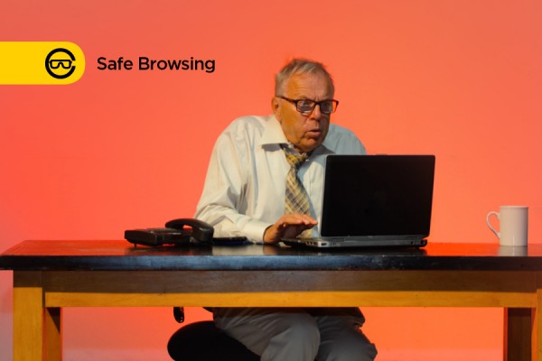 man looking scared at computer