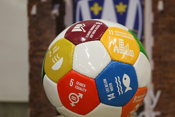 soccer ball with United Nations sustainability goals printed across it