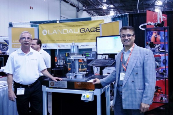 Ken Bishop, Landau Gage vice president of operations (l.) and Research Centre for Integrated Microsystems manager Dr. Rashid Rashidzadeh (r.) pose with their newly developed device “contactless coordinate measuring machine