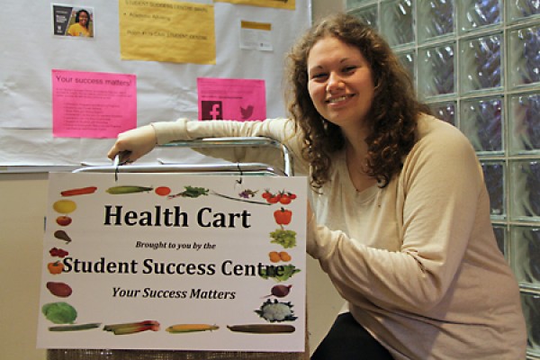 Marissa Younan poses with the health cart
