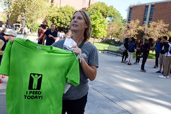 Sherry Palcit holds aloft a &quot;I peed today&quot; T-shirt