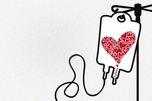 Blood bag holding heart.