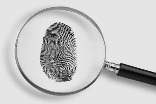 Magnifying glass over fingerprint