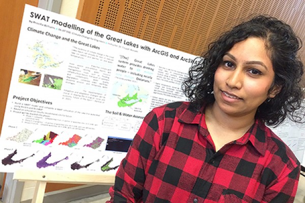 Priscilla Williams displays her research on climate change and the Great Lakes.