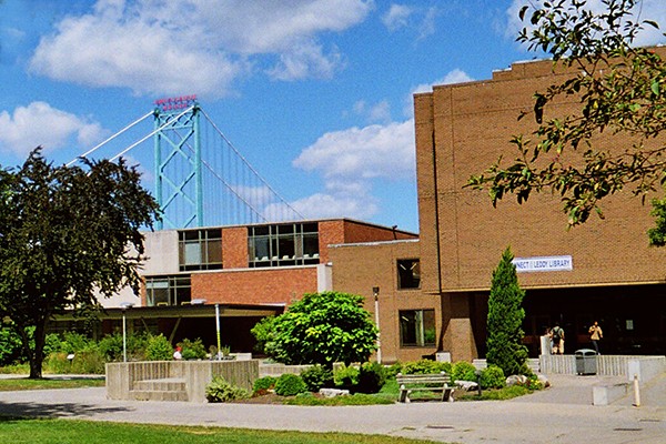 Leddy Library with Ambassador Bridge looming behind it