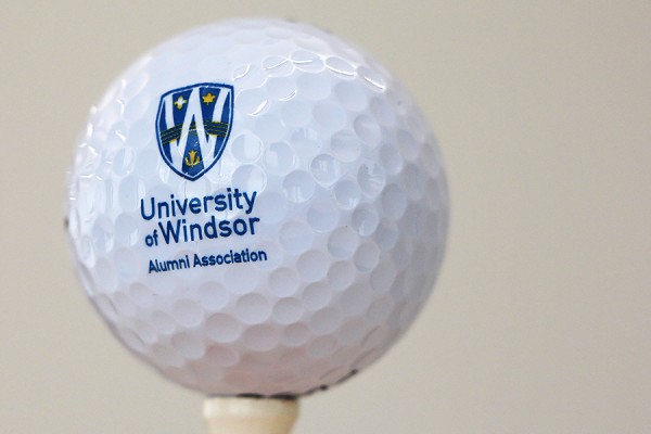 golfball bearing Alumni Association logo