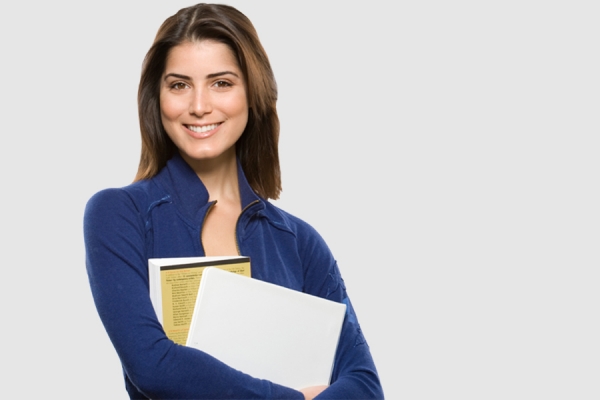 woman holding textbook