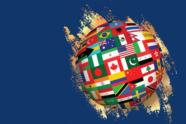 globe wrapped with world flags