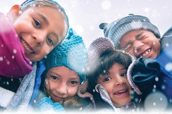 children wearing winter coats