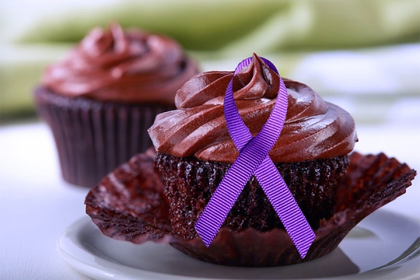 cupcake wapped in purple ribbon