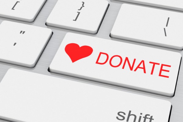 computer keyboard with button marked &quot;Donate&quot;