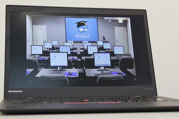 laptop displaying photo of Drupal class